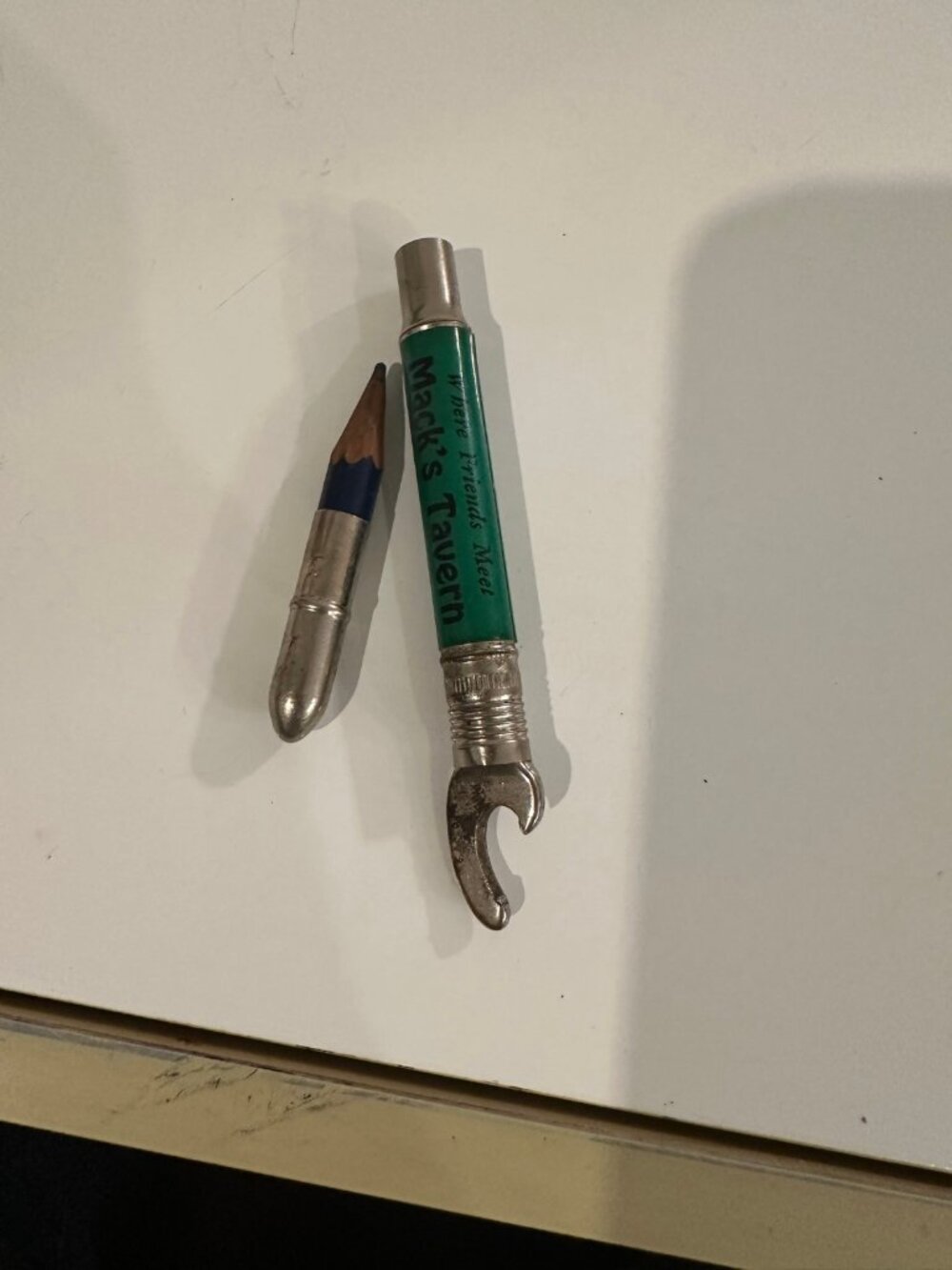 Vintage Macks Tavern Bullet Pencil Bottle Opener Green